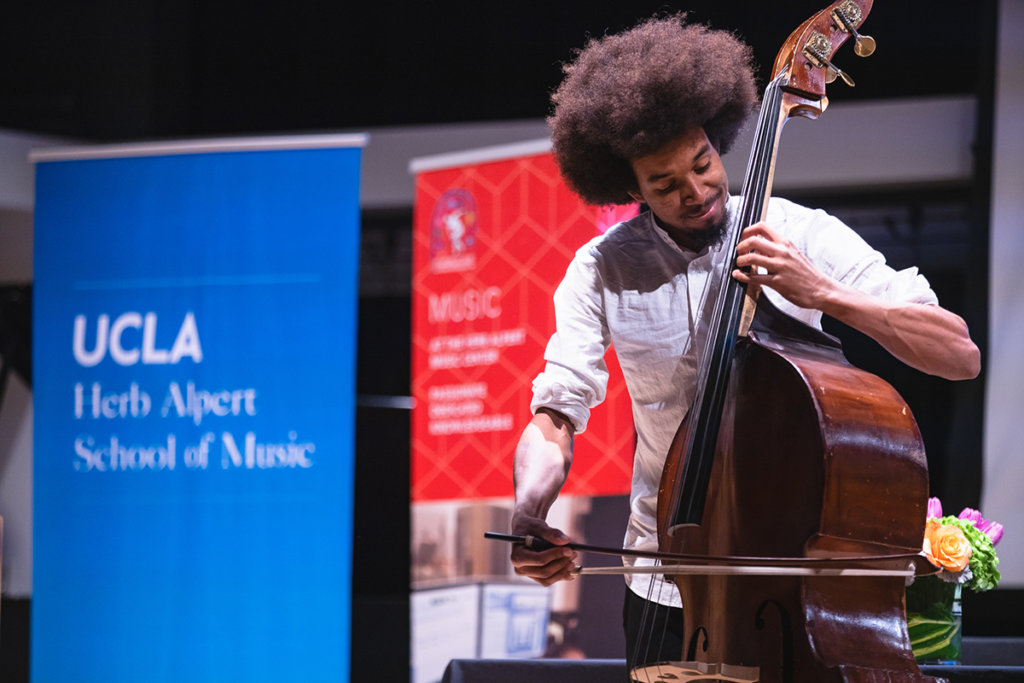 Moses Aubrey, a fourth-year UCLA Student and Herb Alpert School of Music/LACC transfer Scholar, performs at the signing ceremony. Photo: Nick Lie Photography