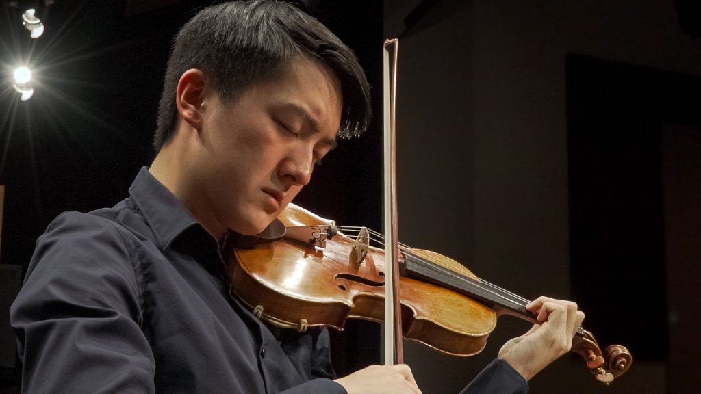 Elvin Hsieh, a student at the UCLA Herb Alpert School of Music, playing UCLA's “Duke of Alcantara” Stradivarius violin. A second Stradivarius was donated to the school by the Twiford Foundation.