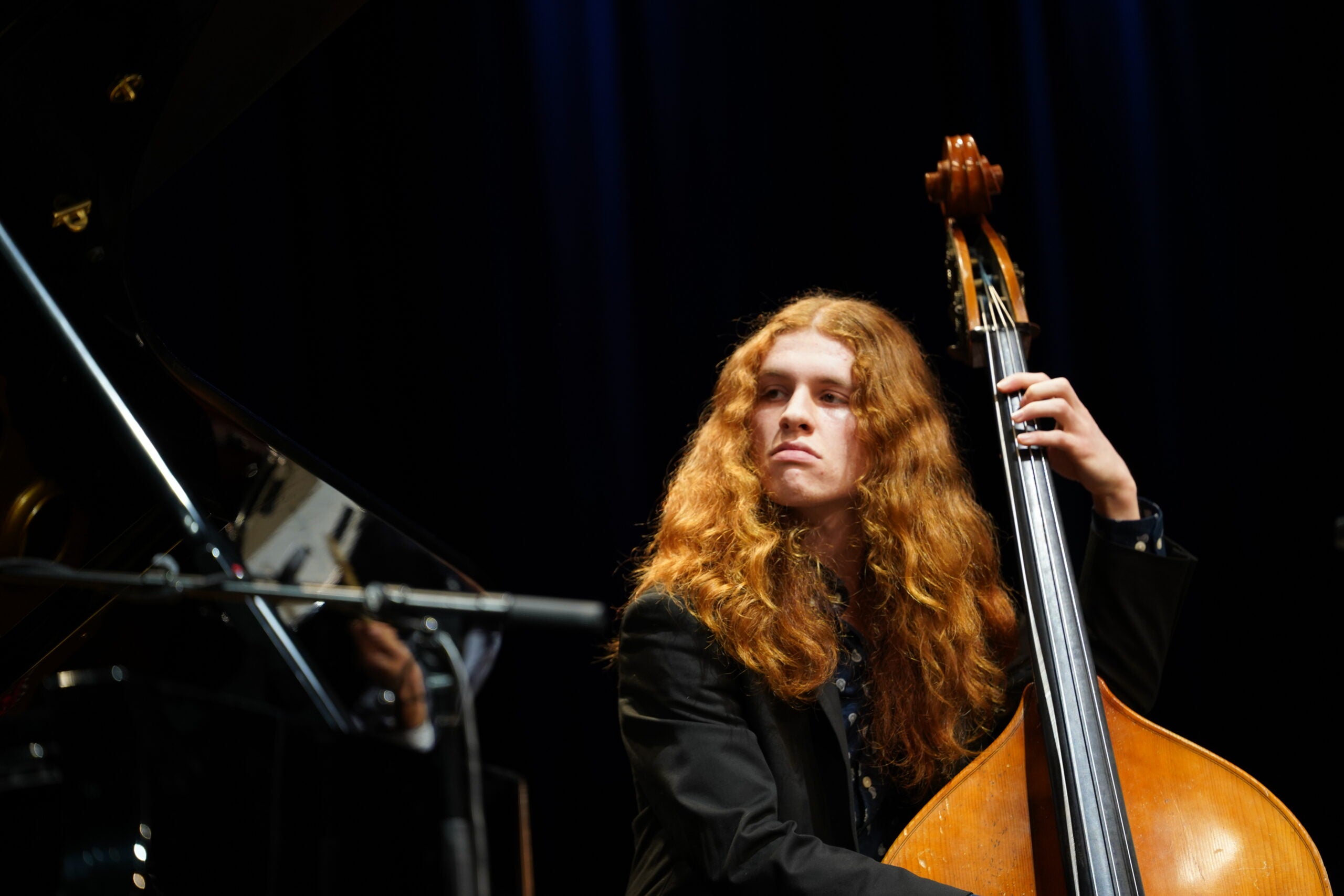 Bassist playing on stage